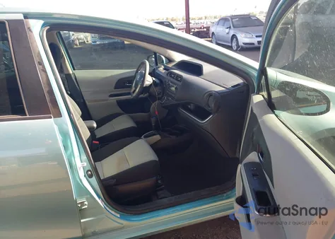 2014 Toyota Prius C Two from USA, damaged, VIN JTDKDTB34E1078885